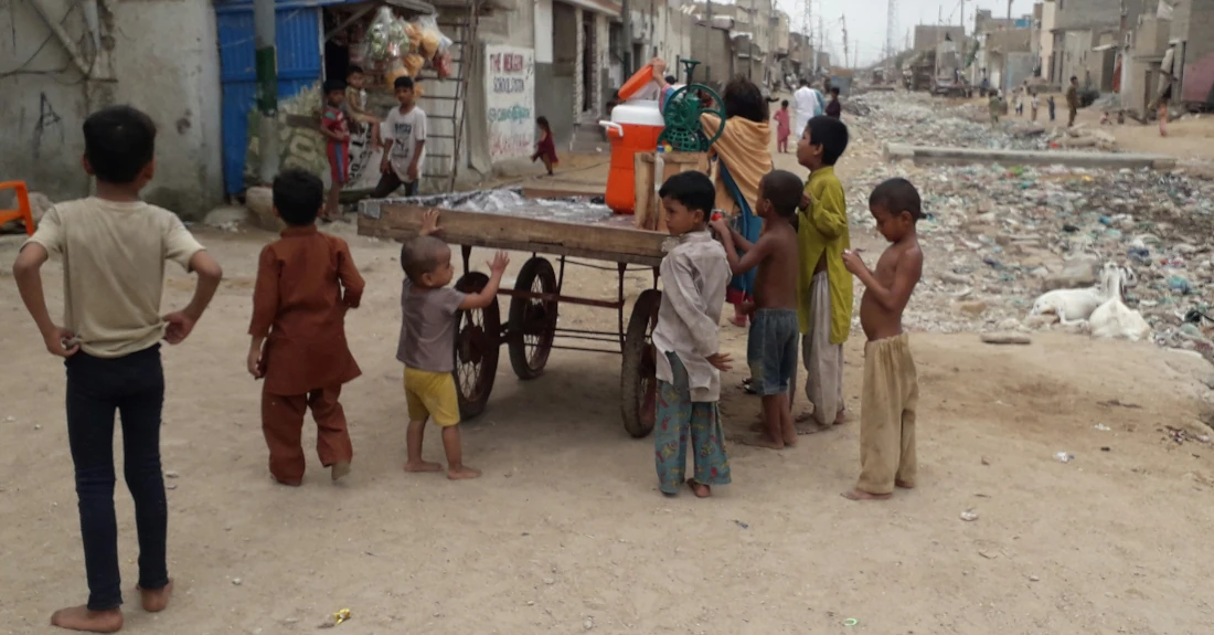 You Can't Have the Cream Without the Meat by Trilety Wade Street scene, Karachi, Pakistan, photo by Haseeb Ali