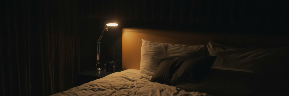 No, Perfect Is Better Than Done by Deepansh Khurana A bed in a bedroom, photo by JP Valery