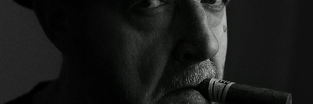 Man with a cigar, photo by Robbie Duncan