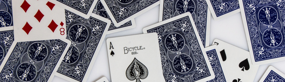 The Magician by Patrick Cahill Close up of a deck of cards, photo by Arnor Ingi Juliusson