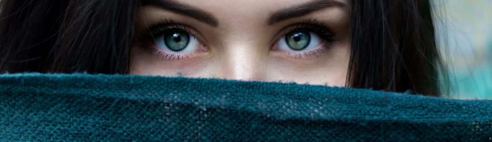 Close up of the face of a woman, photo by Alexandru Zdrobău